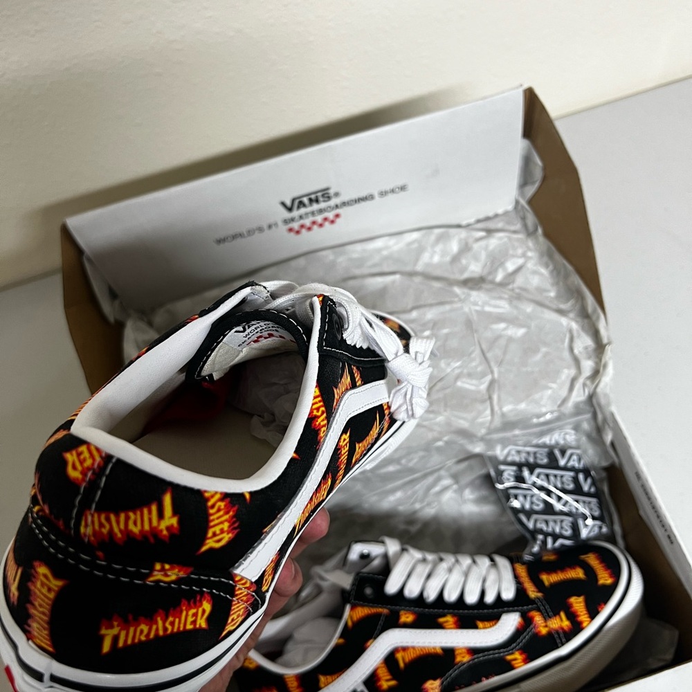 Vans Black and Red Sneakers with Bold Design